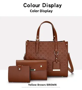 Detail of brown embossed three-piece handbag set featuring tote and matching wallets