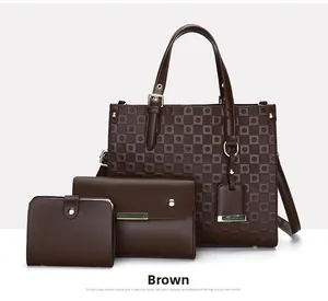 Detailed view of brown 3-piece bag set with geometric embossed pattern and gold hardware