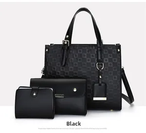Three-piece black tote set with diamond lattice texture and gold hardware detail