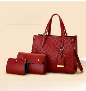 Three-piece set of red cowhide leather tote bag with quilted dot pattern detail