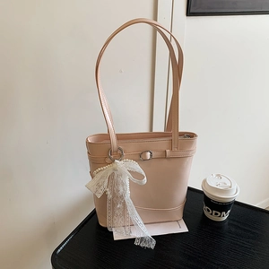 Minimalist light pink PU leather bucket bag with lace bow and pearl charm decoration