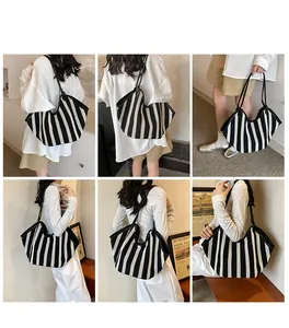 Black and white striped woven tote bag shown from multiple angles on a model