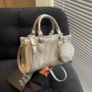 Silver wrinkled texture tote bag with round coin purse and adjustable shoulder strap