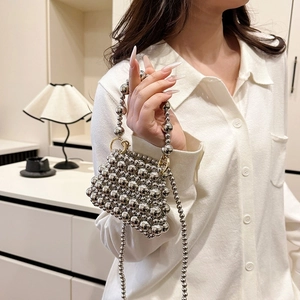 Silver beaded mini handbag with top handle and crossbody chain strap for women