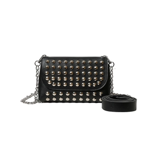 Black studded crossbody bag with silver chain strap and extra wide leather strap