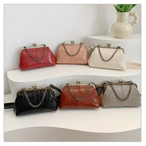 Detailed display of vintage faux crocodile leather bags in multiple stylish colors