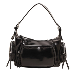 Glossy black motorcycle bag with multiple zippers shown from a front perspective