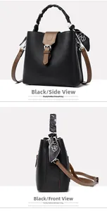 Detail of black lychee grain bucket bag with contrast trim and camellia silk scarf handle