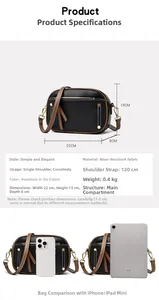Detailed size comparison of the black pebble leather crossbody bag with a mobile phone