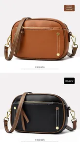 Detail of color-block underarm bag in yellow brown and black with gold rivets