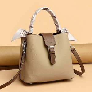 Lychee texture bucket bag in beige and brown with silk scarf handle and leather strap