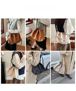 Fashion bucket bag detail showing drawstring closure and woven knot strap in soft leather