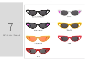 Detail view of cat eye sunglasses available in seven trendy colors with heart cut-outs