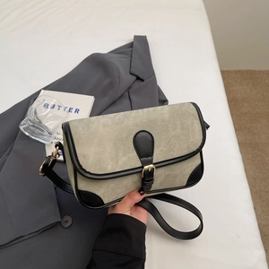 Retro gray-green canvas crossbody bag with black leather trim and gold buckle detail
