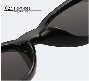 Detailed close-up of lightweight nose pads on stylish black cat-eye sunglasses