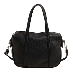 Black lychee texture tote bag with silver hardware and adjustable shoulder strap