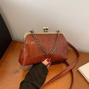 Vintage dark brown crocodile embossed shell bag with metal bead clasp and chain strap