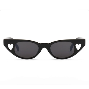 Fashionable black cat-eye sunglasses with hollow heart-shaped details on the frame