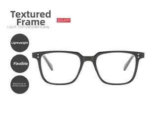 Detail of square black glasses frame with silver rivets and lightweight flexible material