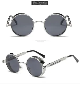 Detail view of silver metal steampunk sunglasses with round grey lenses and spring hinges