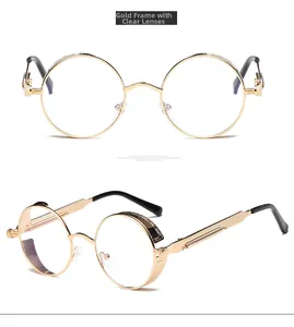 Detail view of steampunk round gold metal frame glasses with clear lenses and spring temple