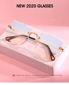 Detail of rimless square sunglasses with gradient lenses and wavy edge on a white pedestal