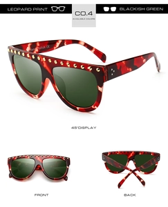 Détails de lunettes de soleil léopard avec clous dorés et verres vert foncé