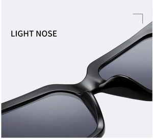 Detail of lightweight nose pads on stylish black square frame sunglasses for comfort