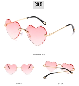 Three-way view of rimless heart sunglasses with pink gradient diamond cut lenses