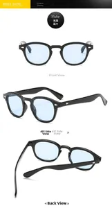 Detail view of vintage round sunglasses with black frame, blue lenses and metal rivets