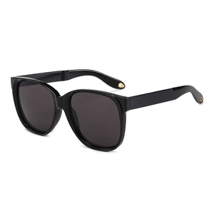 Modische schwarze Oversize-Sonnenbrille im Quadratform mit glänzenden Goldakzenten
