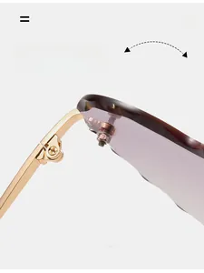 Detail of durable gold metal hinge and purple gradient rimless heart-shaped lens