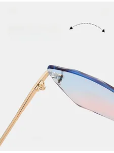 Detail of durable texture hinge and golden metal temple on rimless square sunglasses