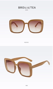 Macro view of square tea brown sunglasses featuring gradient lenses and glitter accents