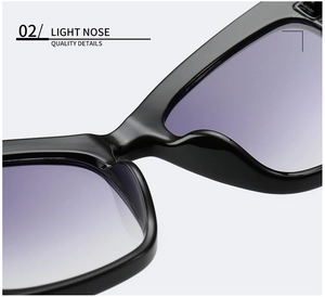 Detailed close-up of light integrated nose pads on black frame sunglasses with purple lenses