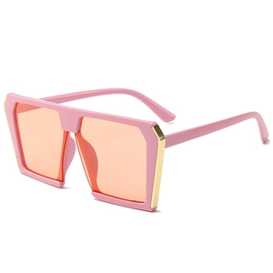 Fashionable oversized square sunglasses with pink frame and orange transparent lenses