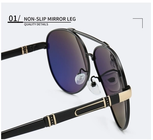 Detail view of non-slip black metal sunglasses legs with elegant gold texture accents