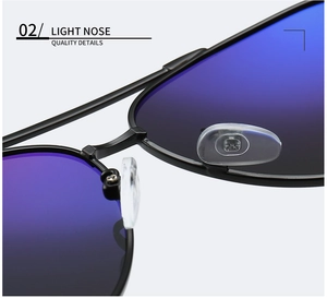 Detailed close-up of soft silicone nose pads and metal frame on polarized sunglasses