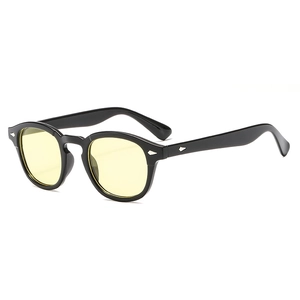 Retro full-rim black glasses with light yellow lenses and silver diamond rivets