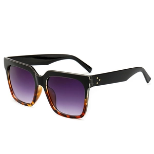 Oversized square sunglasses with tortoiseshell frame and purple gradient lenses