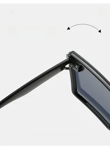 Close-up of durable metal hinge detail on rimless fashion sunglasses with gradient lenses