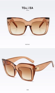 Front and side views of tea-colored square oversized sunglasses with gold accents