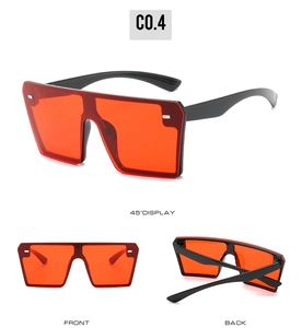 Multi-angle views of red oversized rimless sunglasses featuring silver stud details