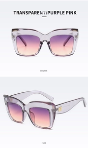 Detail of transparent purple cat-eye sunglasses with gradient lenses and gold hinge accents