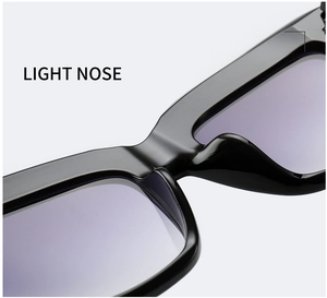 Detailed macro view of ergonomic comfortable nose pads on black square sunglasses