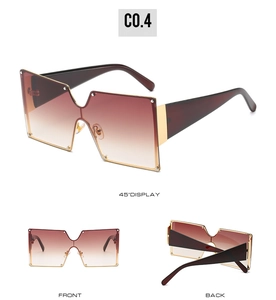 Detail view of square gradient brown sunglasses with gold hinges and V-cut nose bridge
