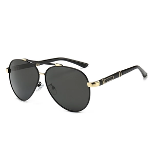 Classic aviator polarized sunglasses for men with black and gold metal frame on white background