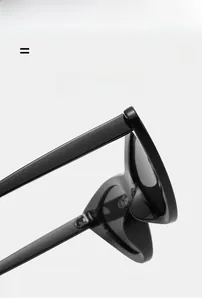 Détail macro montrant la monture en métal noir ultra-flexible et légère des lunettes de chat