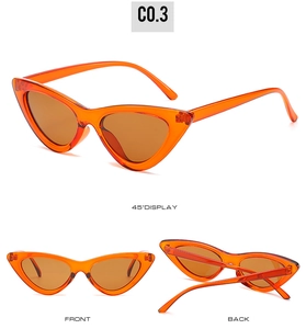 Trois vues de lunettes de soleil œil-de-chat orange: vue de face, arrière et angle de 45 degrés