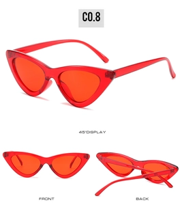Vue en trois plans de lunettes de soleil œil de chat rouges montrant les détails de face et dos